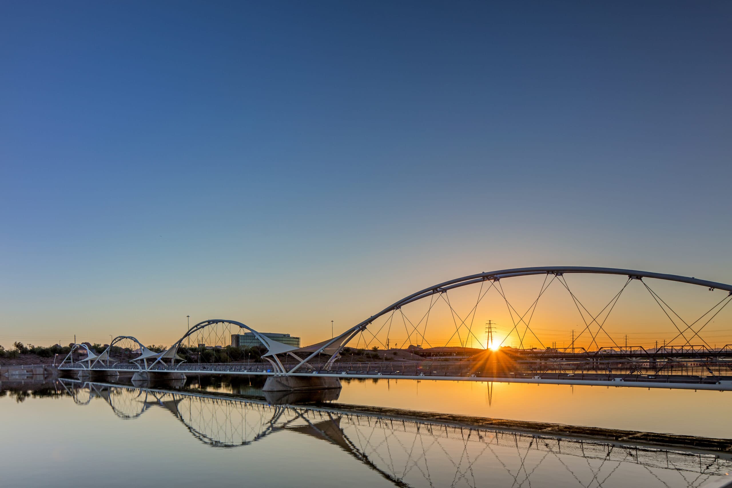 Views of Tempe Town Lake and Bridge at sunset